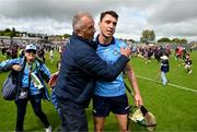 26 May 2024; Chris Crummey of Dublin celebrates with former Dublin GAA chief executive John Costello after the Leinster GAA Hurling Senior Championship Round 5 match between Galway and Dublin at Pearse Stadium in Galway. Photo by Daire Brennan/Sportsfile