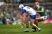 26 May 2024; Shane Bennett of Waterford is tackled by Barry Nash of Limerick during the Munster GAA Hurling Senior Championship Round 5 match between Limerick and Waterford at TUS Gaelic Grounds in Limerick Photo by Tom Beary/Sportsfile