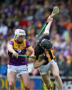 26 May 2024; David Blanchfield of Kilkenny is tackled by Rory O'Connor of Wexford during the Leinster GAA Hurling Senior Championship Round 5 match between Kilkenny and Wexford at UPMC Nowlan Park in Kilkenny. Photo by Ray McManus/Sportsfile