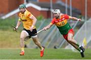 26 May 2024; Niall McKenna of Antrim in action against Chris Nolan of Carlow during the Leinster GAA Hurling Senior Championship Round 5 match between Antrim and Carlow at Corrigan Park in Belfast. Photo by Shauna Clinton/Sportsfile