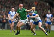 26 May 2024; Barry Nash of Limerick in action against Darragh Lyons of Waterford during the Munster GAA Hurling Senior Championship Round 5 match between Limerick and Waterford at TUS Gaelic Grounds in Limerick Photo by Sam Barnes/Sportsfile