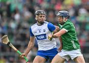 26 May 2024; David Reidy of Limerick in action against Mark Fitzgerald of Waterford during the Munster GAA Hurling Senior Championship Round 5 match between Limerick and Waterford at TUS Gaelic Grounds in Limerick Photo by Sam Barnes/Sportsfile