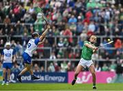 26 May 2024; Cathal O'Neill of Limerick in action against Jamie Barron of Waterford during the Munster GAA Hurling Senior Championship Round 5 match between Limerick and Waterford at TUS Gaelic Grounds in Limerick Photo by Sam Barnes/Sportsfile