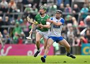 26 May 2024; Will O'Donoghue of Limerick in action against Kevin Mahony of Waterford during the Munster GAA Hurling Senior Championship Round 5 match between Limerick and Waterford at TUS Gaelic Grounds in Limerick Photo by Sam Barnes/Sportsfile