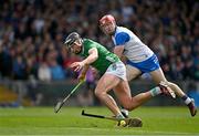 26 May 2024; Gearóid Hegarty of Limerick in action against Tadhg de Burca of Waterford during the Munster GAA Hurling Senior Championship Round 5 match between Limerick and Waterford at TUS Gaelic Grounds in Limerick Photo by Sam Barnes/Sportsfile