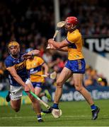 26 May 2024; Peter Duggan of Clare has his shot on goal blocked by Ronan Maher of Tipperary during the Munster GAA Hurling Senior Championship Round 5 match between Tipperary and Clare at FBD Semple Stadium in Thurles, Tipperary. Photo by Michael P Ryan/Sportsfile