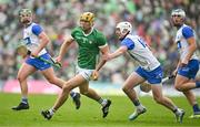 26 May 2024; Dan Morrissey of Limerick in action against Shane Bennett of Waterford during the Munster GAA Hurling Senior Championship Round 5 match between Limerick and Waterford at TUS Gaelic Grounds in Limerick Photo by Sam Barnes/Sportsfile