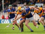 26 May 2024; Bryan O'Mara of Tipperary in action against Mark Rodgers of Clare during the Munster GAA Hurling Senior Championship Round 5 match between Tipperary and Clare at FBD Semple Stadium in Thurles, Tipperary. Photo by Michael P Ryan/Sportsfile