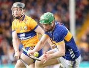 26 May 2024; Brian McGrath of Tipperary in action against Tony Kelly of Clare during the Munster GAA Hurling Senior Championship Round 5 match between Tipperary and Clare at FBD Semple Stadium in Thurles, Tipperary. Photo by Michael P Ryan/Sportsfile
