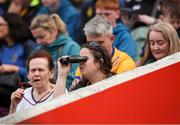 26 May 2024; A supporter looks through binoculars during the Munster GAA Hurling Senior Championship Round 5 match between Tipperary and Clare at FBD Semple Stadium in Thurles, Tipperary. Photo by Michael P Ryan/Sportsfile