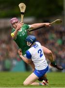 26 May 2024; Shane O Brien of Limerick is tackled by Kieran Bennett of Waterford during the Munster GAA Hurling Senior Championship Round 5 match between Limerick and Waterford at TUS Gaelic Grounds in Limerick Photo by Tom Beary/Sportsfile