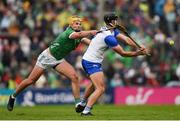 26 May 2024; Mark Fitzgerald of Waterford is hooked by Cathal O Neill of Limerick during the Munster GAA Hurling Senior Championship Round 5 match between Limerick and Waterford at TUS Gaelic Grounds in Limerick Photo by Tom Beary/Sportsfile