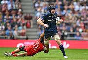 25 May 2024; Ryan Baird of Leinster is tackled by Paul Costes of Toulouse during the Investec Champions Cup final between Leinster and Toulouse at the Tottenham Hotspur Stadium in London, England. Photo by Sam Barnes/Sportsfile