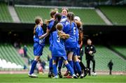 29 May 2024; Marshalstown NS, Wexford, players celebrate after winning a play-off match on penalties in the finals of the girls B cup, for medium schools, during the FAI Primary 5s Finals day at Aviva Stadium in Dublin. Photo by Stephen McCarthy/Sportsfile