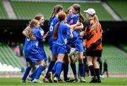 29 May 2024; Marshalstown NS, Wexford, players celebrate after winning a play-off match on penalties in the finals of the girls B cup, for medium schools, during the FAI Primary 5s Finals day at Aviva Stadium in Dublin. Photo by Stephen McCarthy/Sportsfile