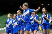 29 May 2024; Mia Whelan of Marshalstown NS, Wexford, and team-mates celebrate during a penalty shoot-out of a play-off match in the finals of the girls B cup, for medium schools, during the FAI Primary 5s Finals day at Aviva Stadium in Dublin. Photo by Stephen McCarthy/Sportsfile