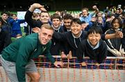 29 May 2024; Republic of Ireland U21 player Killian Phillips with Our Lady’s Grove PS, Dublin, supporters during the FAI Primary 5s Finals day at Aviva Stadium in Dublin. Photo by Stephen McCarthy/Sportsfile