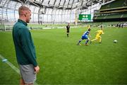 29 May 2024; Republic of Ireland U21 player Killian Phillips watches the action during the FAI Primary 5s Finals day at Aviva Stadium in Dublin. Photo by Stephen McCarthy/Sportsfile