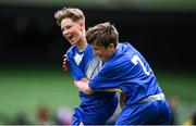 29 May 2024; Lennon O’Brien of Scoil Eoin, Crumlin, Dublin, celebrates with team-mate Killian Flanagan, right, after scoring against Scoil Íosagáin, Buncrana, Inishowen, Donegal, in their Football For All cup match during the FAI Primary 5s Finals day at Aviva Stadium in Dublin. Photo by Stephen McCarthy/Sportsfile