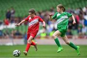 29 May 2024; Laura O’Mullane of Burnfort NS, Cork, and Saoirse Reynolds of Scoil Phádraig, Westport, Mayo, during the FAI Primary 5s Finals day at Aviva Stadium in Dublin. Photo by Stephen McCarthy/Sportsfile
