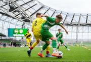 29 May 2024; Fionn Jennings of St Joseph’s PS, Ballinrobe, Mayo, in action against Ryan Gallagher of Illistrin NS, Donegal, left, during the FAI Primary 5s Finals day at Aviva Stadium in Dublin. Photo by Stephen McCarthy/Sportsfile