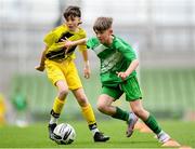 29 May 2024; Matthew Tierney of St Joseph’s PS, Ballinrobe, Mayo, in action against Diarmuid McFadden of Illistrin NS, Donegal, left, during the FAI Primary 5s Finals day at Aviva Stadium in Dublin. Photo by Stephen McCarthy/Sportsfile
