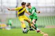 29 May 2024; Matthew Tierney of St Joseph’s PS, Ballinrobe, Mayo, and Oisin Cuskelly of Illistrin NS, Donegal, left, during the FAI Primary 5s Finals day at Aviva Stadium in Dublin. Photo by Stephen McCarthy/Sportsfile