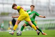 29 May 2024; Rory McGettigan of Illistrin NS, Donegal, in action against Fionn Jennings of St Joseph’s PS, Ballinrobe, Mayo, right, during the FAI Primary 5s Finals day at Aviva Stadium in Dublin. Photo by Stephen McCarthy/Sportsfile