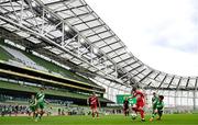 29 May 2024; A general view of the action between Beaumont BNS, Blackrock, Cork, red, and St Joseph’s PS, Ballinrobe, Mayo, green, during the FAI Primary 5s Finals day at Aviva Stadium in Dublin. Photo by Stephen McCarthy/Sportsfile