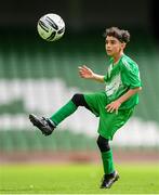 29 May 2024; Mounir Soufan of Scoil Phádraig, Westport, Mayo, during the FAI Primary 5s Finals day at Aviva Stadium in Dublin. Photo by Stephen McCarthy/Sportsfile