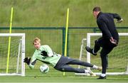31 May 2024; Goalkeeper Caoimhin Kelleher, left, and Goalkeeping coach Rene Gilmartin during a Republic of Ireland training session at the FAI National Training Centre in Abbotstown, Dublin. Photo by Stephen McCarthy/Sportsfile