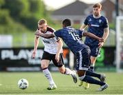 31 May 2024; Paul Doyle of Dundalk in action against Sadou Diallo of Derry City during the SSE Airtricity Men's Premier Division match between Dundalk and Derry City at Oriel Park in Dundalk, Louth. Photo by Michael P Ryan/Sportsfile