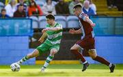 31 May 2024; Neil Farrugia of Shamrock Rovers in action against Evan Weir of Drogheda United during the SSE Airtricity Men's Premier Division match between Drogheda United and Shamrock Rovers at Weavers Park in Drogheda, Louth. Photo by Shauna Clinton/Sportsfile