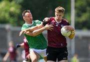 1 June 2024; Cillian Fahy of Limerick in action against Eoin Walsh of London during the Tailteann Cup Group 4 Round 3 match between Limerick and London at Parnell Park in Dublin. Photo by Daire Brennan/Sportsfile