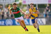 1 June 2024; Conor Hand of Roscommon in action against Aidan O'Shea of Mayo during the GAA Football All-Ireland Senior Championship Round 2 match between Roscommon and Mayo at Dr Hyde Park in Roscommon. Photo by Ben McShane/Sportsfile