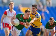 1 June 2024; Matthew Ruane of Mayo is tackled by Ciarán Lennon of Roscommon during the GAA Football All-Ireland Senior Championship Round 2 match between Roscommon and Mayo at Dr Hyde Park in Roscommon. Photo by Ben McShane/Sportsfile