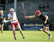 1 June 2024; Christopher Gildernew of Tyrone in action against Oisin Moylan of Sligo during the Electric Ireland Corn Jerome O'Leary Celtic Challenge final match between Tyrone and Sligo at Fr Tierney Park in Ballyshannon, Donegal. Photo by Oliver McVeigh/Sportsfile