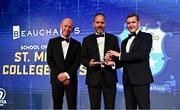 1 June 2024; Steven Hennessy of St Mary's College, Rathmines, is presented with the Beauchamps School of the Year award by Edward Evans of Beauchamps and Leinster Rugby president Billy Murphy during the 2024 Leinster Rugby Awards Ball at The InterContinental Hotel in Dublin. Photo by Harry Murphy/Sportsfile