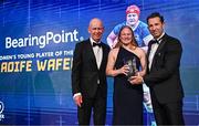 1 June 2024; Aoife Wafer is presented with the BearingPoint Women’s Young Player of the Year award by Eric Conway of BearingPoint and Leinster Rugby president Billy Murphy during the 2024 Leinster Rugby Awards Ball at The InterContinental Hotel in Dublin. Photo by Harry Murphy/Sportsfile
