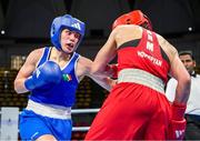 2 June 2024; Grainne Walsh of Ireland, left, in action against Ani Hovsepyan of Armenia during their Women's 66kg Quarterfinals at the Paris 2024 Olympic Boxing Qualification Tournament at Hua Mak Indoor Stadium in Bangkok, Thailand. Photo by Joe Walsh/Sportsfile