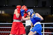 2 June 2024; Grainne Walsh of Ireland, right, in action against Ani Hovsepyan of Armenia during their Women's 66kg Quarterfinals at the Paris 2024 Olympic Boxing Qualification Tournament at Hua Mak Indoor Stadium in Bangkok, Thailand. Photo by Joe Walsh/Sportsfile