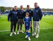 31 May 2024; Matchday mascot Grace Conway with Leinster players Jordan Larmour, James Lowe, Ross Byrne and Will Connors during the United Rugby Championship match between Leinster and Connacht at the RDS Arena in Dublin. Photo by Harry Murphy/Sportsfile