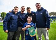 31 May 2024; Matchday mascot Charlie Reynolds with Leinster players Jordan Larmour, James Lowe, Ross Byrne and Will Connors during the United Rugby Championship match between Leinster and Connacht at the RDS Arena in Dublin. Photo by Harry Murphy/Sportsfile