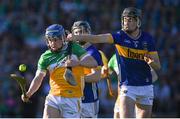 1 June 2024; Colin Spain of Offaly in action against Adam Daly of Tipperary during the oneills.com GAA Hurling All-Ireland U20 Championship final match between Offaly and Tipperary at UPMC Nowlan Park in Kilkenny. Photo by Shauna Clinton/Sportsfile