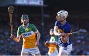 1 June 2024; Oisín O’Donoghue of Tipperary in action against Ter Guinan of Offaly during the oneills.com GAA Hurling All-Ireland U20 Championship final match between Offaly and Tipperary at UPMC Nowlan Park in Kilkenny. Photo by Shauna Clinton/Sportsfile