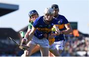 1 June 2024; Podge O’Dwyer of Tipperary in action against Leigh Kavanagh of Offaly during the oneills.com GAA Hurling All-Ireland U20 Championship final match between Offaly and Tipperary at UPMC Nowlan Park in Kilkenny. Photo by Shauna Clinton/Sportsfile