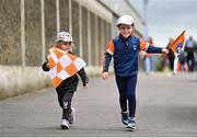 2 June 2024; Two young Armagh supporters make their way to the stadium before the GAA Football All-Ireland Senior Championship Round 2 match between Derry and Armagh at Celtic Park in Derry. Photo by Seb Daly/Sportsfile