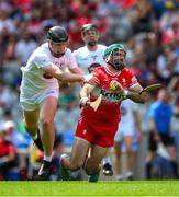 2 June 2024; Sean Cassidy of Derry is tackled by Paul Dolan of Kildare during the Christy Ring Cup final match between Kildare and Derry at Croke Park in Dublin. Photo by Ray McManus/Sportsfile