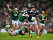 2 June 2024; Tony Brosnan of Kerry gets away from Sean Ryan, 18, and Brian O'Halloran of Meath during the GAA Football All-Ireland Senior Championship Round 2 match between Meath and Kerry at Páirc Tailteann in Navan, Meath. Photo by Stephen Marken/Sportsfile