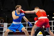 2 June 2024; Martin McDonagh of Ireland, right, in action against Davit Chaloyan of Armenia during their Men's +92kg Finals at the Paris 2024 Olympic Boxing Qualification Tournament at Hua Mak Indoor Stadium in Bangkok, Thailand. Photo by Joe Walsh/Sportsfile
